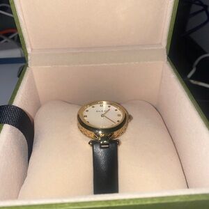 Gucci Gold and Black Leather Watch